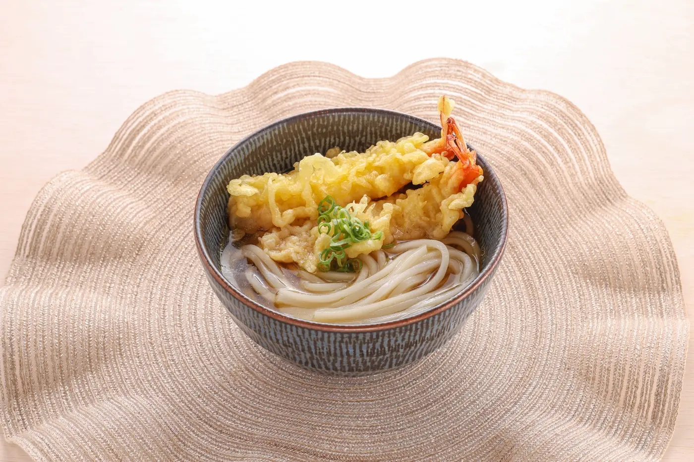 A bowl of Japanese rice-flour noodles with tempura