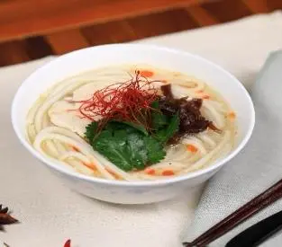 Rice-flour noodle dish served as ramen
