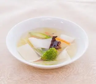 Rice-flour wonton served in a clear broth
